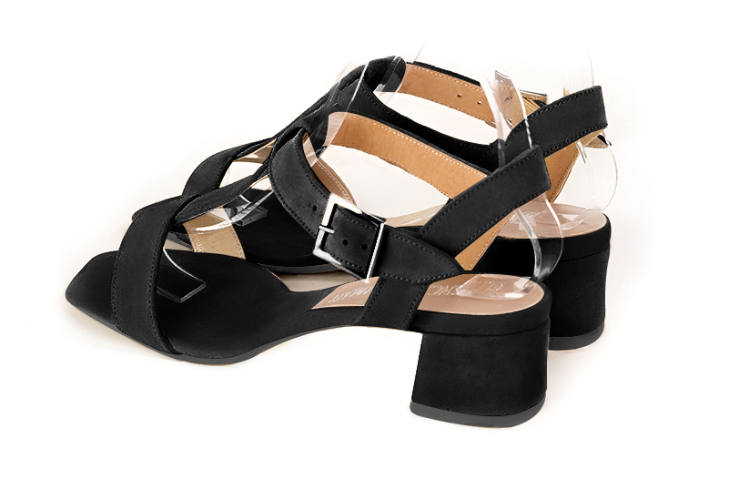 Matt black women's fully open sandals, with an instep strap. Square toe. Low flare heels. Rear view - Florence KOOIJMAN